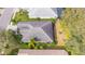 Aerial view highlighting home's roof and landscaping at 12327 Thornhill Ct, Lakewood Ranch, FL 34202