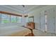 Spacious bedroom with large windows and dresser at 12327 Thornhill Ct, Lakewood Ranch, FL 34202