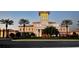 Elegant exterior elevation of the country club with palm trees at 12327 Thornhill Ct, Lakewood Ranch, FL 34202