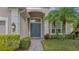 Double front doors with a paver walkway and exterior light fixtures at 12327 Thornhill Ct, Lakewood Ranch, FL 34202