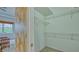 Spacious walk-in closet with shelving for optimal storage at 12327 Thornhill Ct, Lakewood Ranch, FL 34202