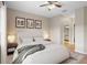 Main bedroom with a queen bed and ensuite bathroom at 9505 Amberdale Ct # 201, Riverview, FL 33578