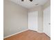 Bright bedroom with wood flooring and double door closet at 9505 Amberdale Ct # 201, Riverview, FL 33578