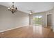 Living room with light wood floors and access to a balcony at 9505 Amberdale Ct # 201, Riverview, FL 33578