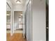 Hallway with bathroom access and mirrored closets at 9505 Amberdale Ct # 201, Riverview, FL 33578