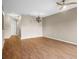 Spacious living room featuring hardwood floors and a ceiling fan at 9505 Amberdale Ct # 201, Riverview, FL 33578