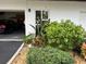 Landscaped exterior of the property, including lush plants at 10469 Waterbird Way, Bradenton, FL 34209