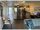 Bright living room with water views and comfortable seating at 10469 Waterbird Way, Bradenton, FL 34209