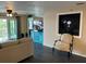 Spacious living area with comfortable seating and TV at 10469 Waterbird Way, Bradenton, FL 34209