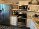 Modern kitchen featuring stainless steel appliances at 10469 Waterbird Way, Bradenton, FL 34209