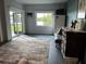 Bright guest room with water views and tiled floor at 10469 Waterbird Way, Bradenton, FL 34209
