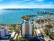 Stunning aerial view of waterfront building and marina at 340 S Palm Ave # 15, Sarasota, FL 34236