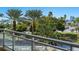Balcony with glass railings offering scenic city and water views at 340 S Palm Ave # 15, Sarasota, FL 34236