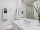 Clean bathroom with updated fixtures and white tile at 340 S Palm Ave # 15, Sarasota, FL 34236