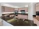 Updated kitchen featuring granite countertops and stainless steel appliances at 340 S Palm Ave # 15, Sarasota, FL 34236
