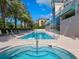 Relaxing pool and spa area with lounge chairs at 340 S Palm Ave # 15, Sarasota, FL 34236