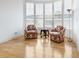 Cozy sitting area with two armchairs and a wood accent table at 340 S Palm Ave # 15, Sarasota, FL 34236