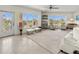 Spacious living area featuring abundant natural light and access to a balcony at 7820 34Th W Ave # 202, Bradenton, FL 34209