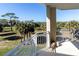 Private balcony overlooking lush landscape and distant views at 7820 34Th W Ave # 202, Bradenton, FL 34209