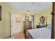 Bright bedroom with double bed, dresser, and ample closet space at 6033 Arlene Way # 3, Bradenton, FL 34207