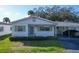 House exterior showcasing a single-story home with a carport at 6033 Arlene Way # 3, Bradenton, FL 34207