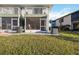 Property exterior showcases a two-story building with a screened porch at 26356 Nadir Rd # 101, Punta Gorda, FL 33983