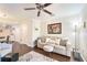 Living room boasts a neutral color palette and plenty of natural light at 26356 Nadir Rd # 101, Punta Gorda, FL 33983