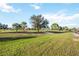 Private backyard with a view of the golf course at 26356 Nadir Rd # 101, Punta Gorda, FL 33983