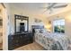 Bright bedroom with nautical decor and ceiling fan at 26356 Nadir Rd # 101, Punta Gorda, FL 33983