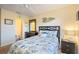 Bedroom with a queen bed and en-suite bathroom at 26356 Nadir Rd # 101, Punta Gorda, FL 33983