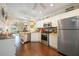 Spacious kitchen featuring stainless steel appliances and wood flooring at 26356 Nadir Rd # 101, Punta Gorda, FL 33983