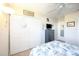Bright bedroom with double doors and carpet flooring at 26356 Nadir Rd # 101, Punta Gorda, FL 33983