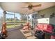 Relaxing screened patio overlooks a lush green golf course at 26356 Nadir Rd # 101, Punta Gorda, FL 33983