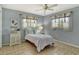 Guest bedroom with two windows at 328 Eden Dr, Englewood, FL 34223