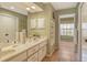 Double vanity bathroom with tile flooring at 328 Eden Dr, Englewood, FL 34223