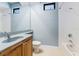 Clean bathroom with a single sink vanity, shower/tub combo at 4579 Tuscana Dr, Sarasota, FL 34241