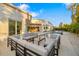 Beautiful backyard pool with a modern outdoor lounge area and tropical landscaping at 2512 Jefferson Cir, Sarasota, FL 34239