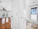 Clean bathroom with toilet, sink, and shower at 107 Los Cedros Dr, Anna Maria, FL 34216