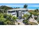 Luxury beachfront home with expansive ocean views and private pool at 104 Sunset Ln, Holmes Beach, FL 34217