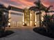 Luxury waterfront home with modern design and two-car garage at 104 Sunset Ln, Holmes Beach, FL 34217