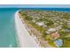Beachfront property nestled in a coastal community with ocean views at 104 Sunset Ln, Holmes Beach, FL 34217
