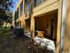 Back exterior of building showing multiple patio areas at 8807 White Sage Loop # 1903, Lakewood Ranch, FL 34202