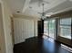 Bedroom with double doors leading to balcony at 8807 White Sage Loop # 1903, Lakewood Ranch, FL 34202