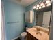 Light blue bathroom with tub and shower at 8807 White Sage Loop # 1903, Lakewood Ranch, FL 34202