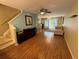 Hardwood floor living room with an open floor plan, and view of the stairs at 8807 White Sage Loop # 1903, Lakewood Ranch, FL 34202