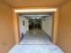 Attached garage with ample space for parking and storage at 8807 White Sage Loop # 1903, Lakewood Ranch, FL 34202