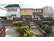 Townhome with brick and siding, steps to entrance at 705 W Venice Ave # 705-B, Venice, FL 34285