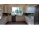 Modern kitchen in community building with stainless steel appliances at 8146 Stirling Falls Cir, Sarasota, FL 34243