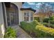 Inviting home exterior featuring a landscaped walkway and screened entry at 8146 Stirling Falls Cir, Sarasota, FL 34243