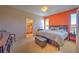 Spacious main bedroom with king-size bed and en-suite bathroom at 8146 Stirling Falls Cir, Sarasota, FL 34243